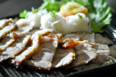 Close-up of served food in plate