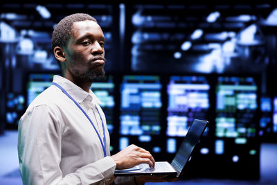 Young man using laptop