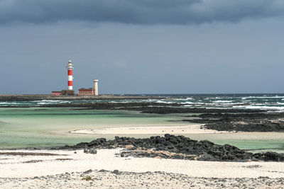 Beautiful landscape with tostón lighthouse, el cotillo, fuerteventura canary island, sky with clouds