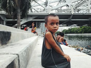 Portrait of beautiful young woman in water