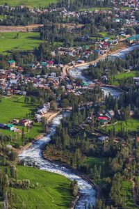 High angle view of road passing through city