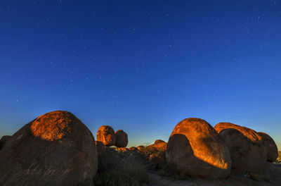 Panoramic view of landscape against clear blue sky