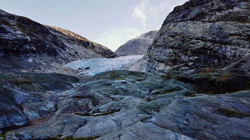 Scenic view of rocky mountains against sky