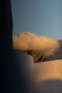 Scenic view of mountain against sky during sunset