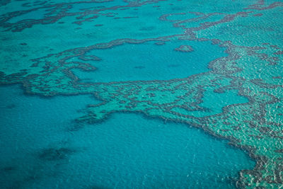 High angle view of blue sea