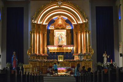 Statue in illuminated building