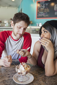 Young couple at a diner.