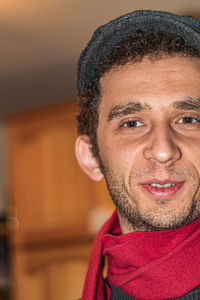 Close-up portrait of smiling young man