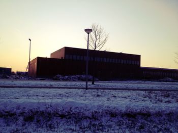 Built structure on field against clear sky
