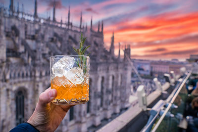 Drinking delicious cocktail with an amazing view of the milan