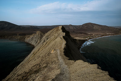 Scenic view of rock formations against sky