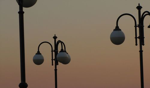 Low angle view of street light against clear sky