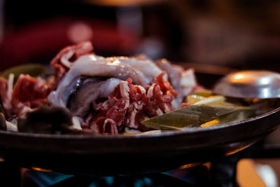 Close-up of meat on barbecue grill