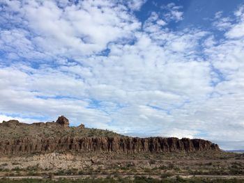 Scenic view of rock formation against sky