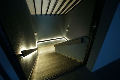 High angle view of illuminated staircase in building