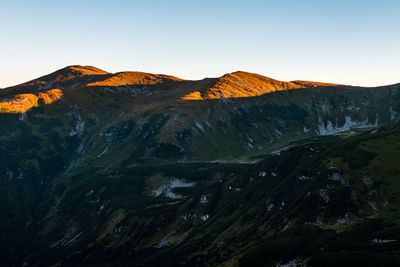 Scenic view of mountains against clear sky