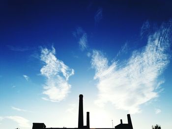 Low angle view of vapor trail against sky