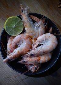 High angle view of fish in plate on table