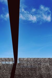 View of trees against blue sky