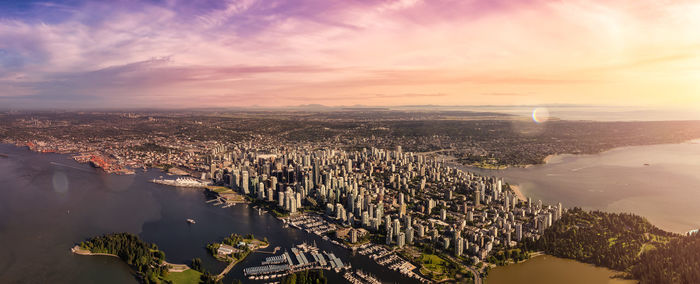 High angle view of buildings against sky during sunset