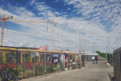 View of road against cloudy sky