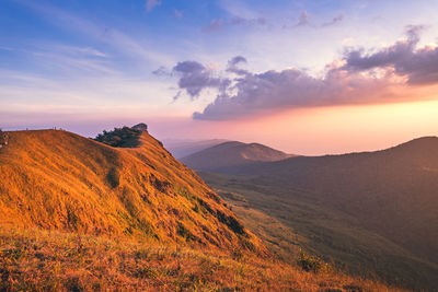 Scenic view of mountains against sky during sunset