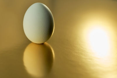 Close-up of green ball on table
