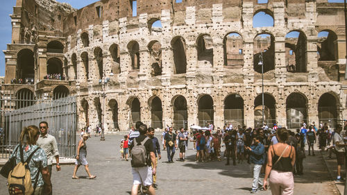 Group of people in front of historical building
