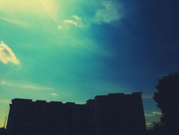 Low angle view of built structure against blue sky