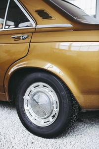 Close-up of vintage car on street