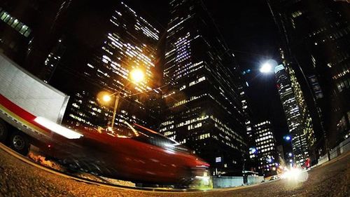 Light trails on city street at night