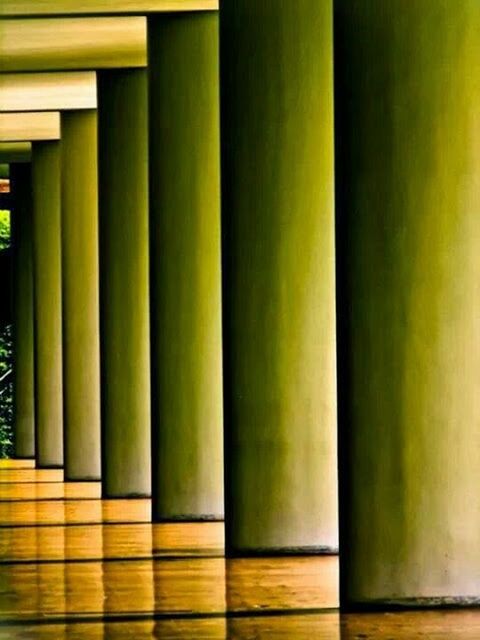 indoors, architecture, built structure, architectural column, in a row, pattern, window, column, flooring, empty, no people, repetition, door, wood - material, corridor, building, day, glass - material, modern, absence