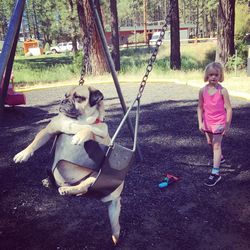 Full length of boy playing in park