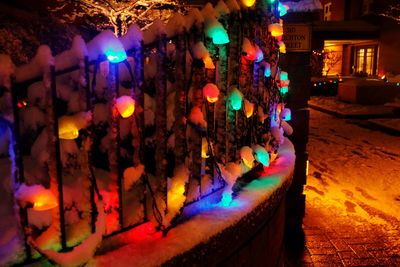 Close-up of illuminated christmas tree at night