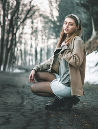 Portrait of beautiful woman in forest
