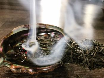 Close-up of water pouring from glass