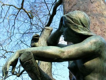Low angle view of trees against sky