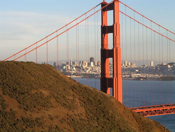 View of suspension bridge in city