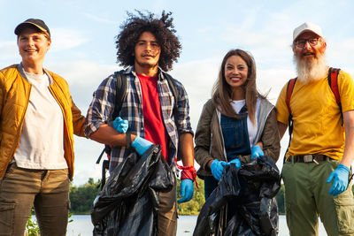 Diverse friends united for nature cleanup