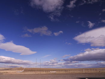 Scenic view of land against sky with bench, pampas  argentina 