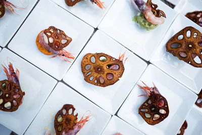 Close-up of finger food in plate on table. gourmet buffet. high angle view of food.