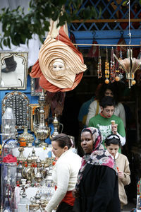 People at market stall
