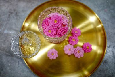 High angle view of pink roses on table