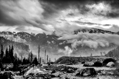 Scenic view of mountains against sky during winter