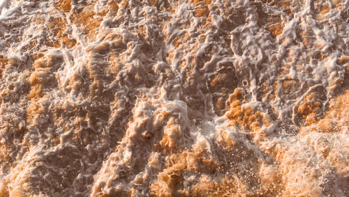 Full frame shot of rocks in water