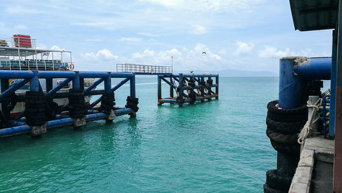 Pier on sea against sky