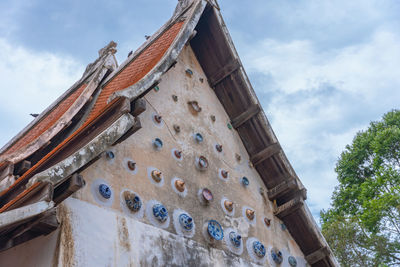Low angle view of old building against sky