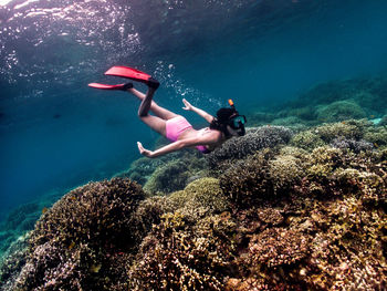 Man swimming in sea