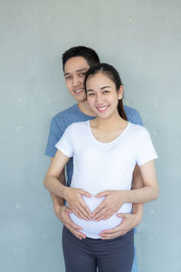 Portrait of a smiling young couple