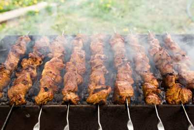 Close-up of meat on barbecue grill